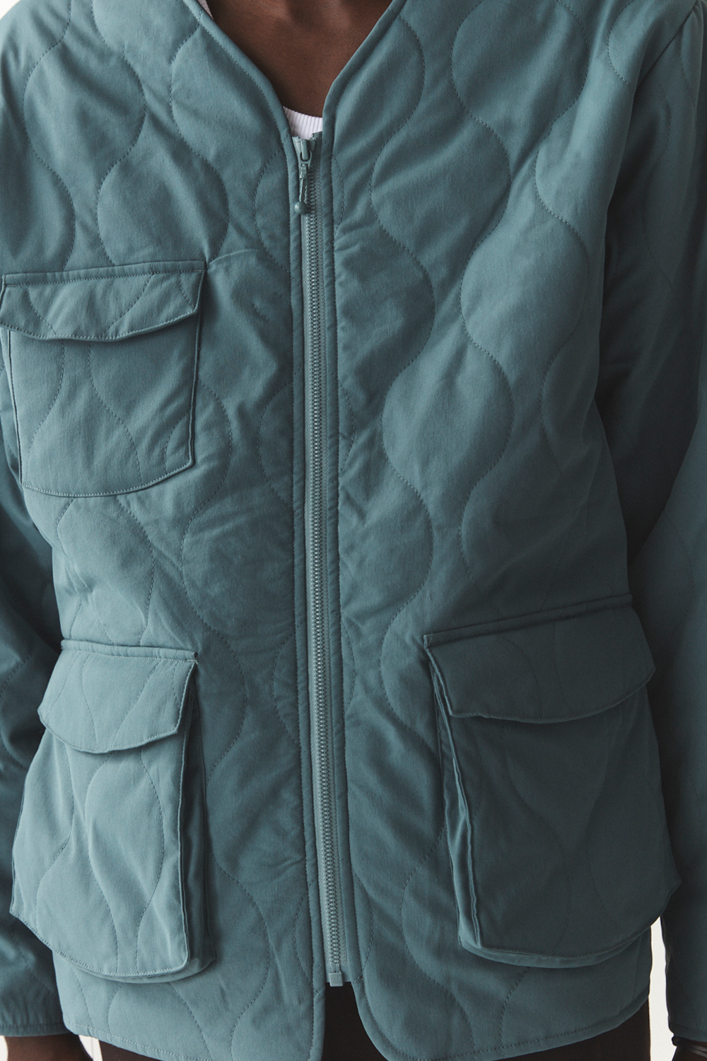 GEWATTEERDE VOERING SS'24 FADED AQUA 
