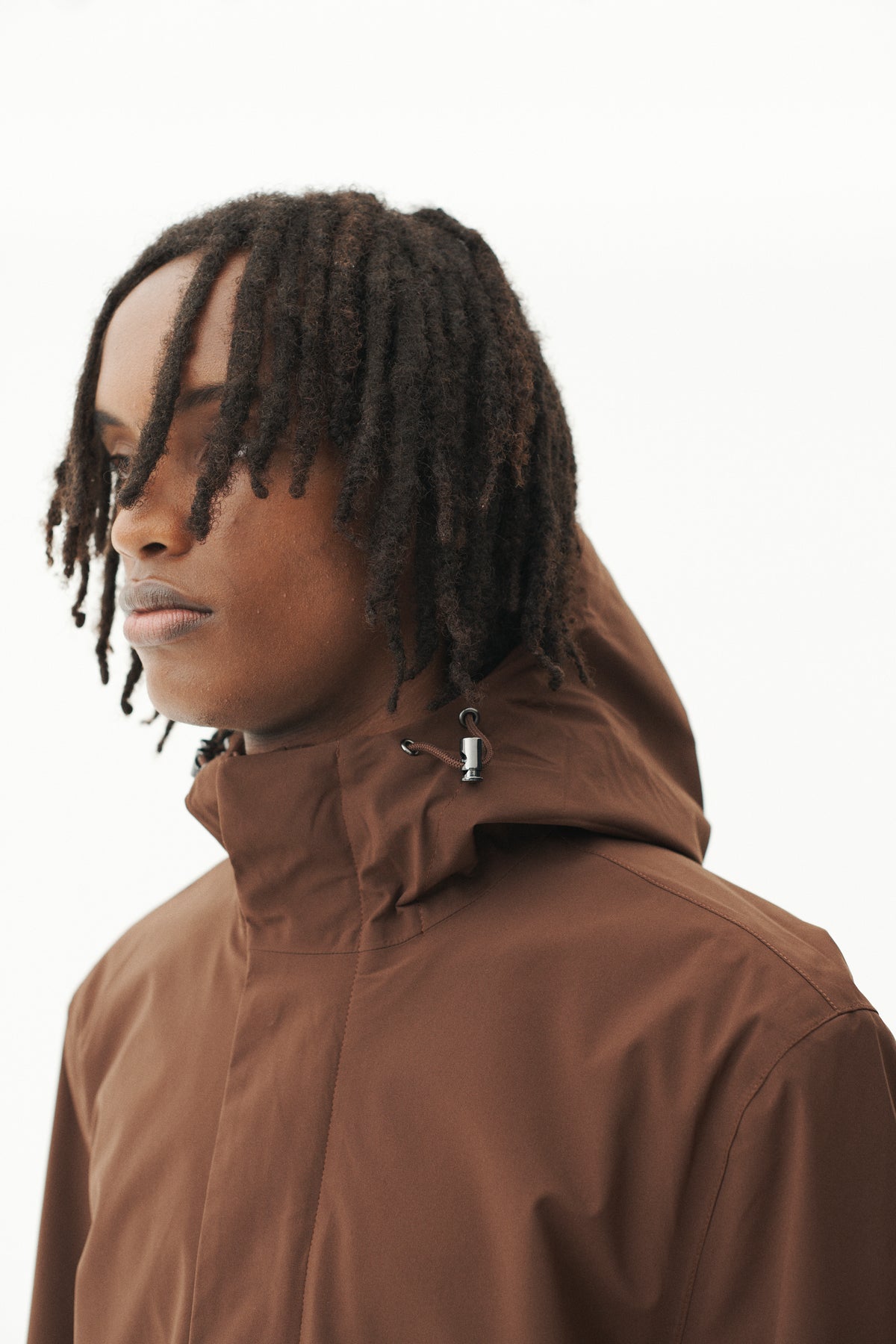TERROR WEATHER RAIN SHELL AW26 CHOCOLATE