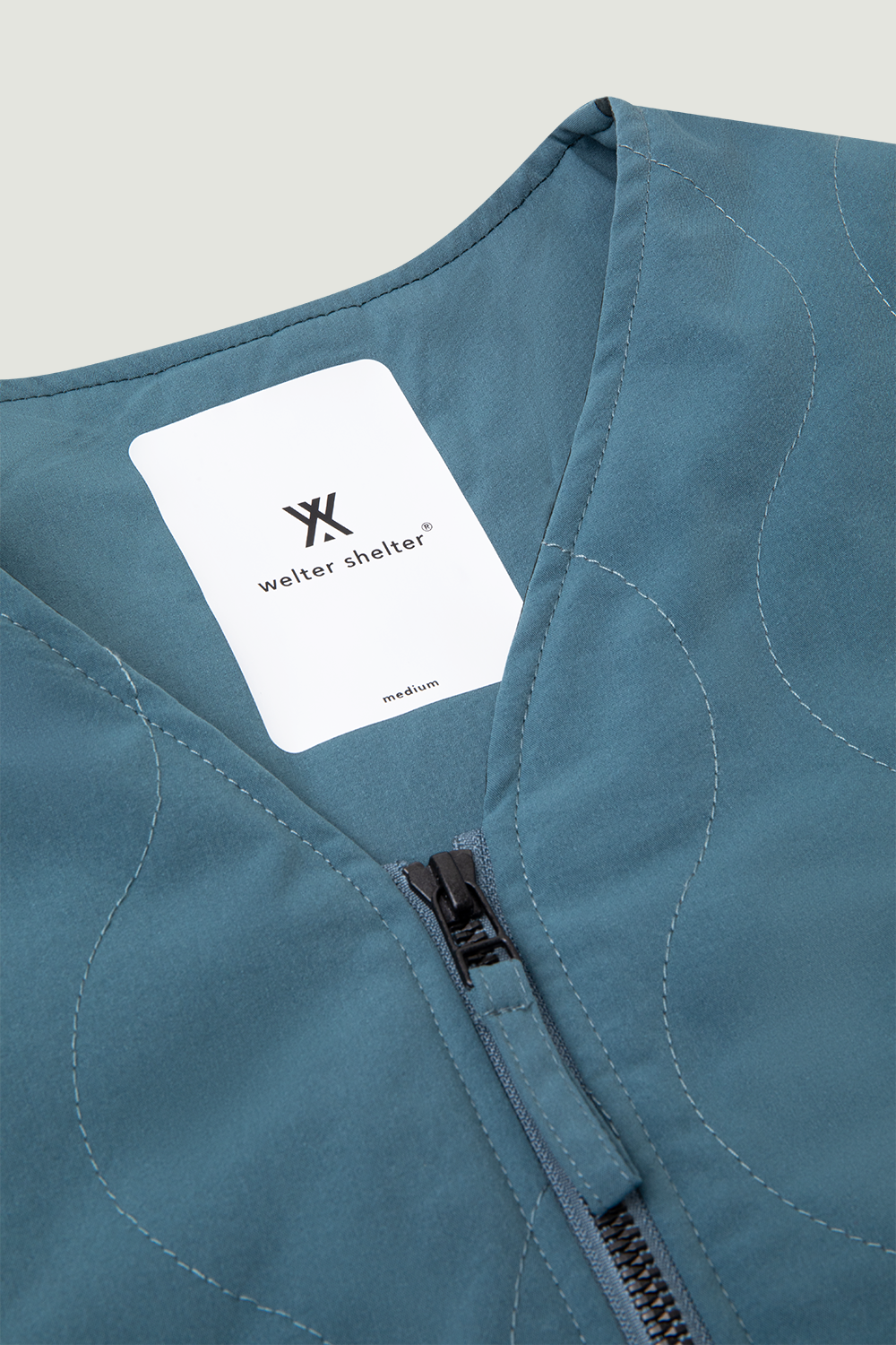 GEWATTEERDE VOERING SS'24 FADED AQUA 