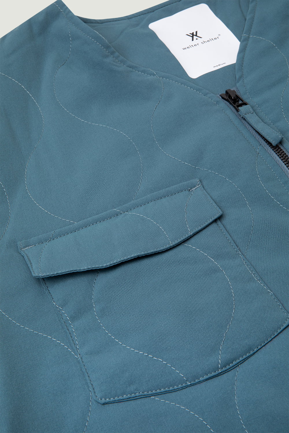 GEWATTEERDE VOERING SS'24 FADED AQUA 